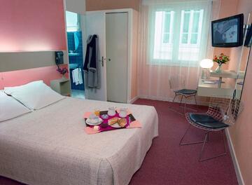 Revotel - Chambre avec lit double